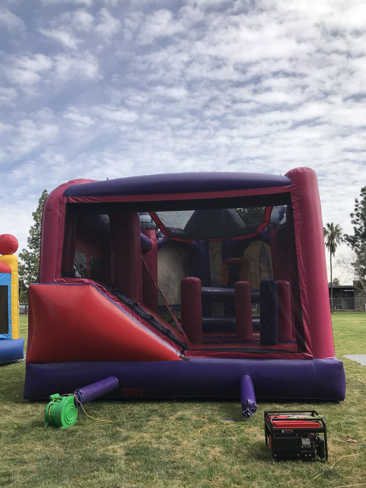 5n1 princess 3D combo bounce house rental in San Diego, interior view of the jump floor, basketball hoop and climb-up