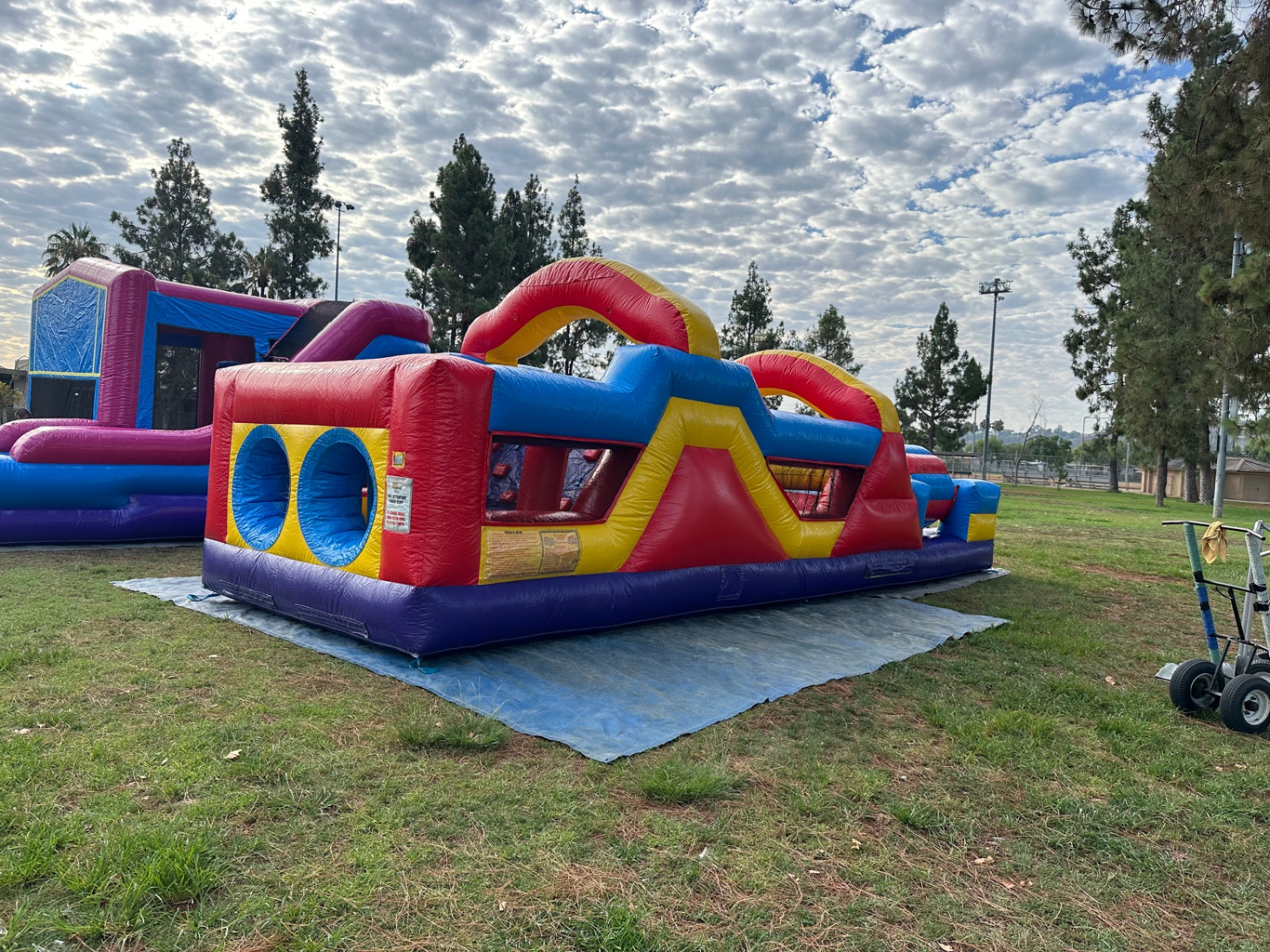 33ft monster obstacle course rental in San Diego, full length profile with pop-up obstacles and climb wall