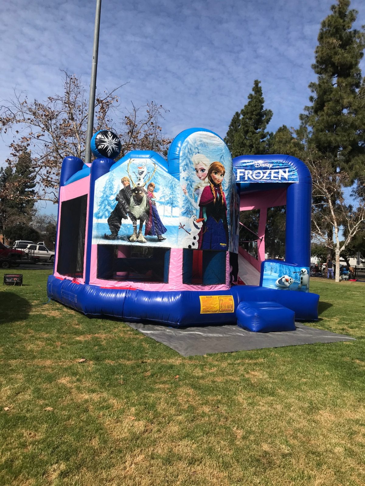 5n1 frozen combo bounce house rental in San Diego, opposite corner view showing Kristoff, Sven and Anna art