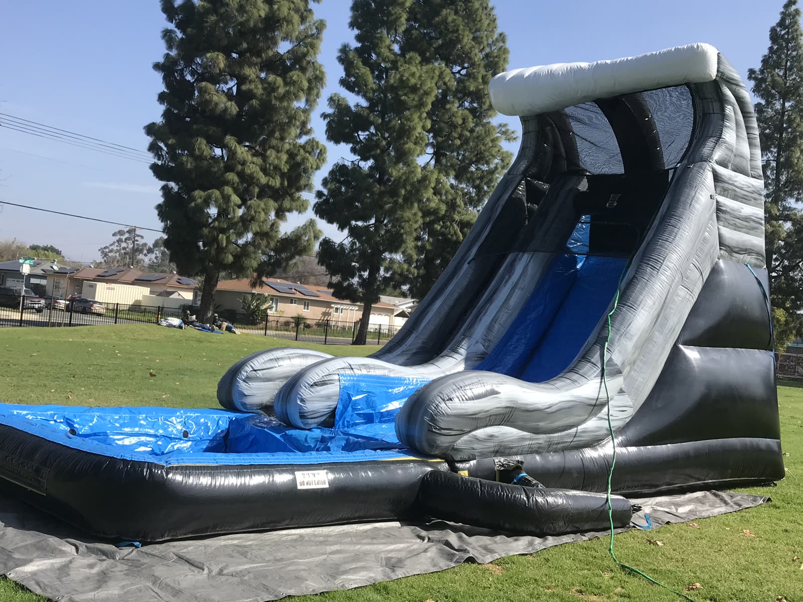 Water slide rental in San Diego, 18ft wave setup close view of the splash pool landing