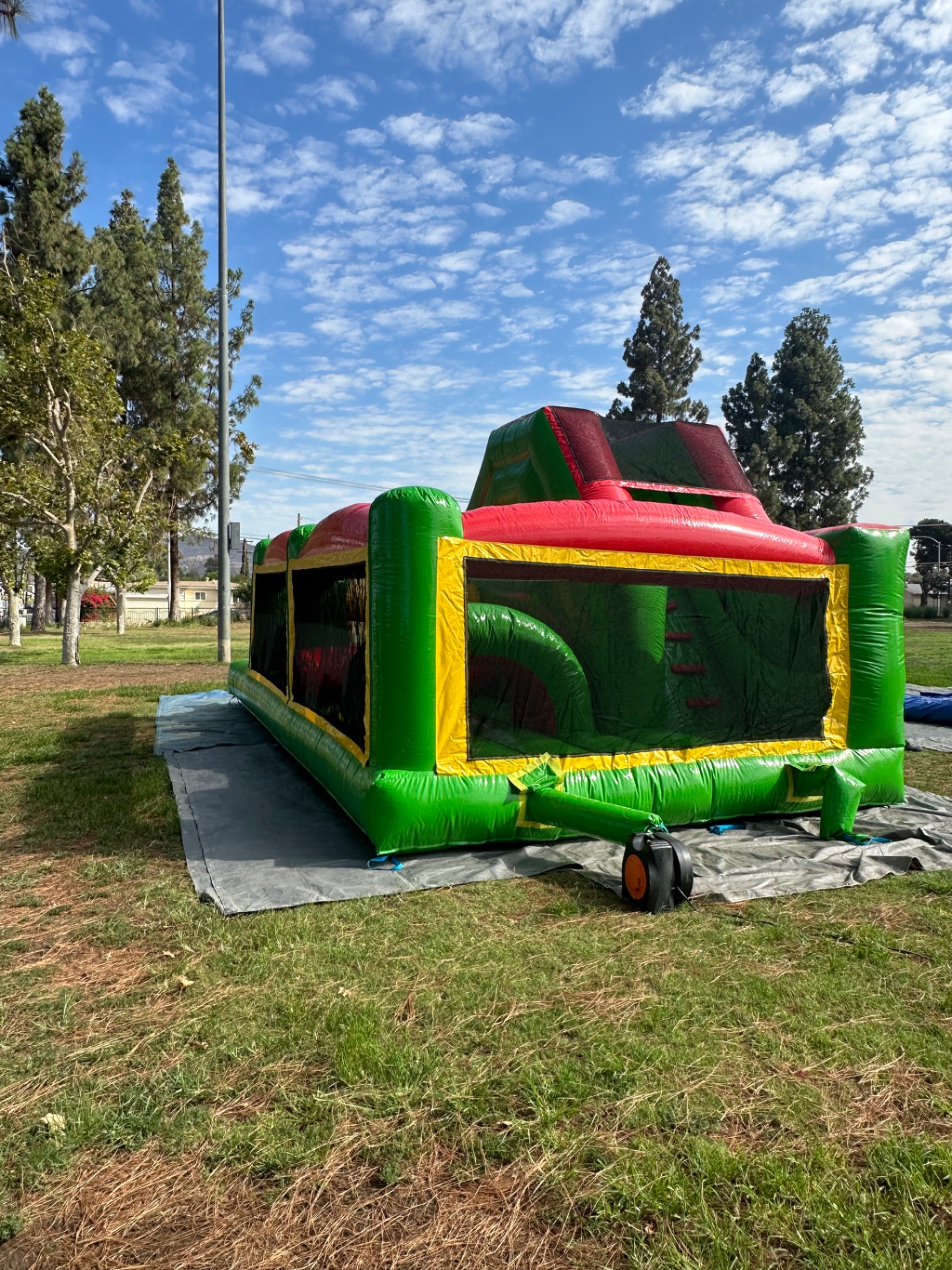 Challenge course obstacle rental in San Diego, green and red lane, back-side profile showing the length of the obstacle run