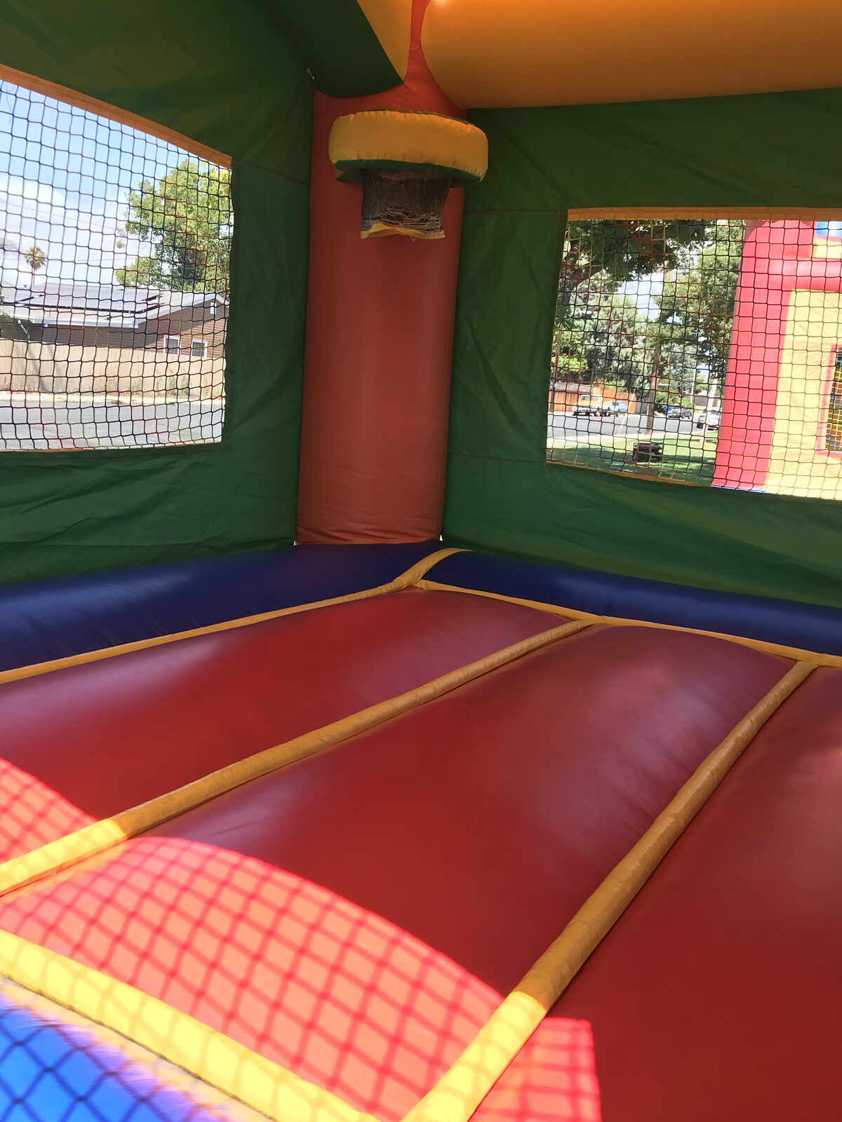 2n1 summer balloon combo bounce house rental in San Diego, interior corner view of the mesh windows and padded columns