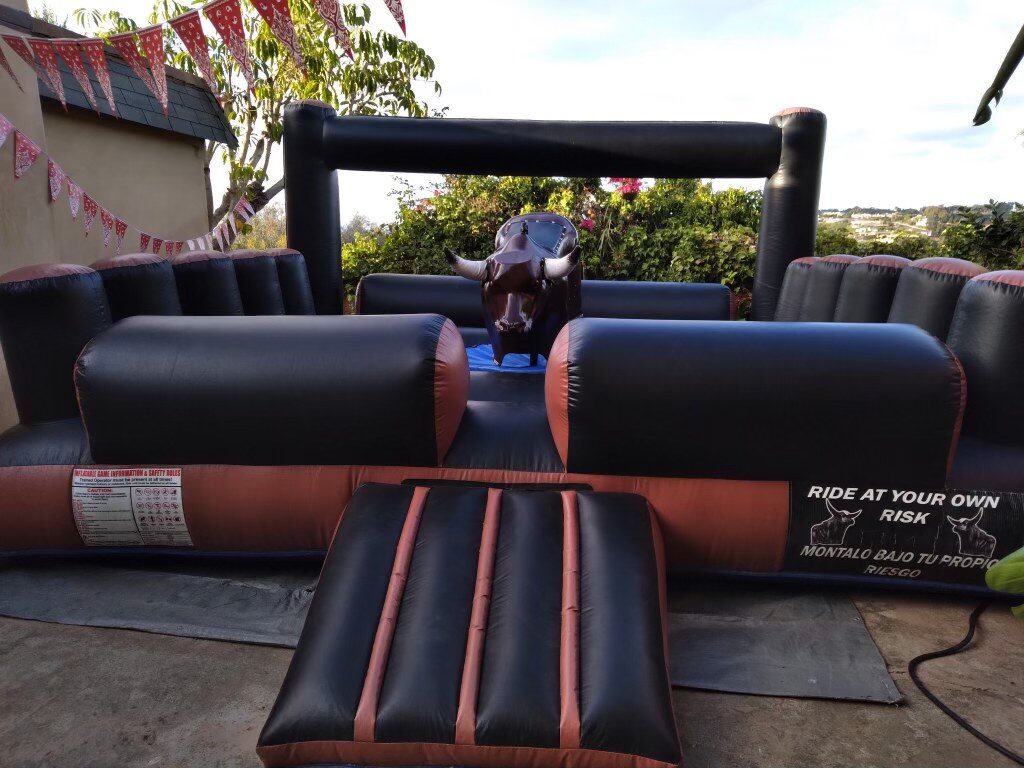 Mechanical bull rental in San Diego, 13x13 setup close-up of the bull and inflatable safety mat